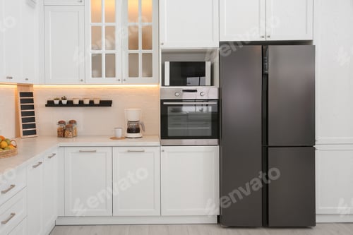 Preview: Light kitchen interior with stylish furniture and modern equipment