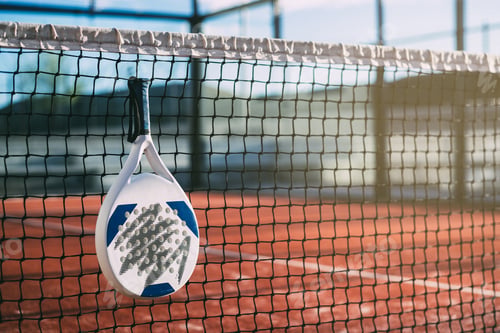 Preview: Padel blade racket hanging on the net