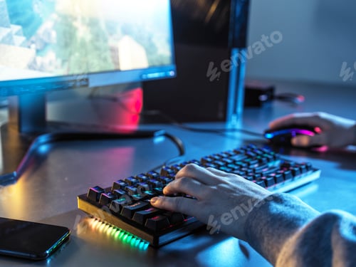 Preview: Teenage boy using keyboard and mouse