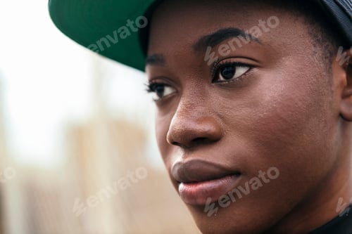 Preview: cool african american woman wearing a cap
