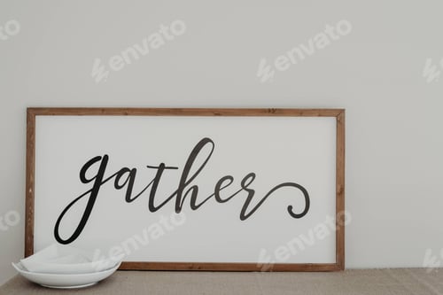 Preview: Frame with the writing gather next to a plate isolated on white background