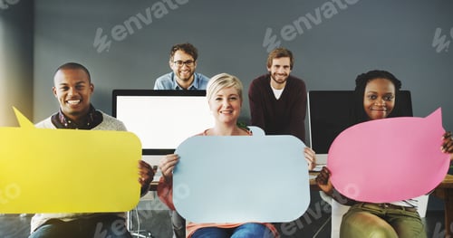 Preview: Shot of a diverse group of people holding up speech bubbles in a modern office