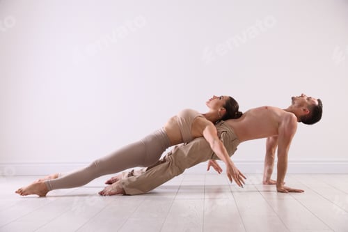 Preview: Couple of professional dancers training in studio. Space for text