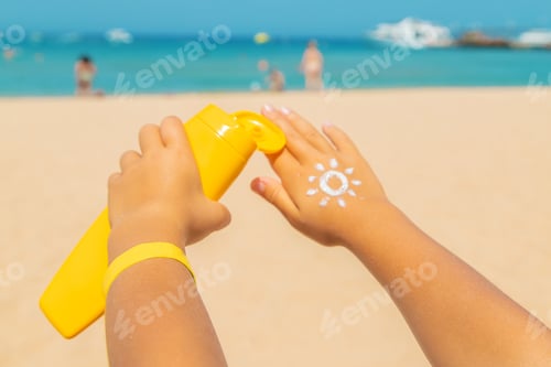 Preview: Sunscreen on the skin of a child. Selective focus.