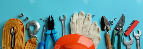 Preview: Concept of Labor Day with different tools on blue background