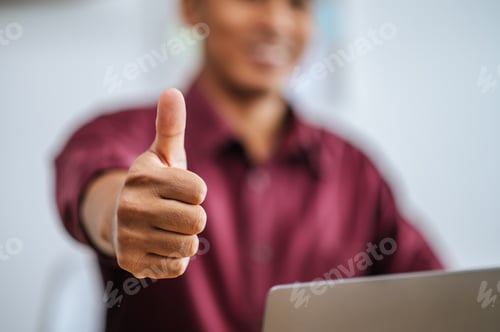 Preview: A man working with laptop