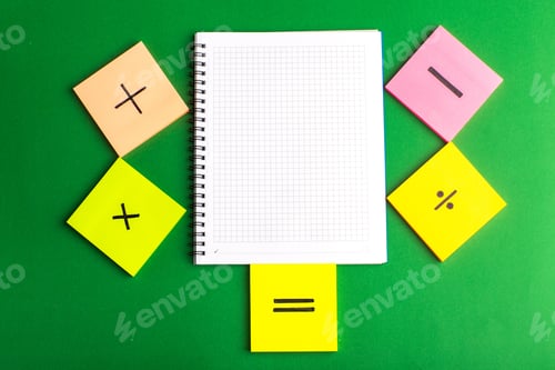 Preview: front view different signs on colorful stickers with copybook on green background math color science