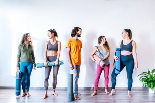 Preview: Man and women talking after yoga lesson