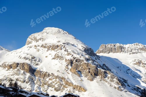 Preview: Alpine winter mountain landscape. French Alps with snow.