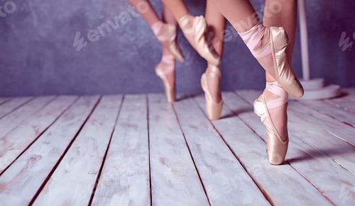 Preview: The Close-Up Feet Of A Three Young Ballerinas In Pointe Shoes Against The Background Of The Wooden