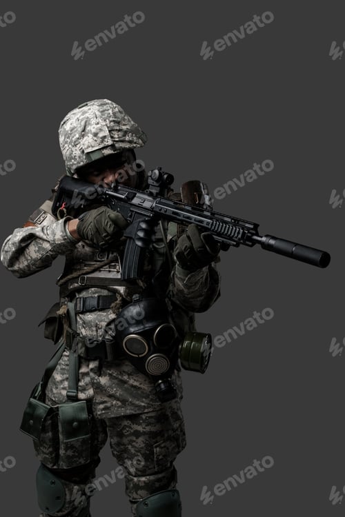 Preview: African soldier aiming rifle isolated on dark background