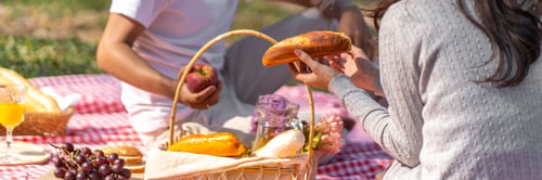 Preview: In love couple enjoying picnic time in park outdoors Picnic.