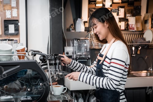Smiling Young Woman Prepares Espresso Drink in Cafe