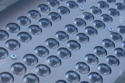 Preview: Close-up of panel with many small lamps and few bolts