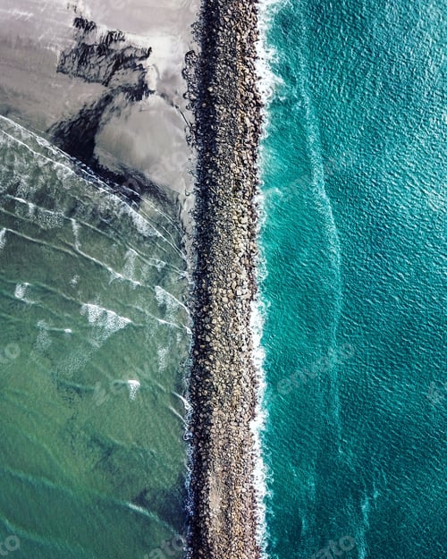 Preview: Vertical aerial shot of Columbia River meeting the Pacific Ocean at Fort Stevens