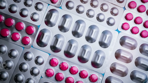 Preview: Pink tablets in blister pack and silver aluminium foil pack for capsule and tablets pills