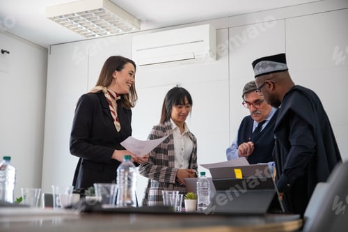 Preview: Business people discussing during a conference, international group