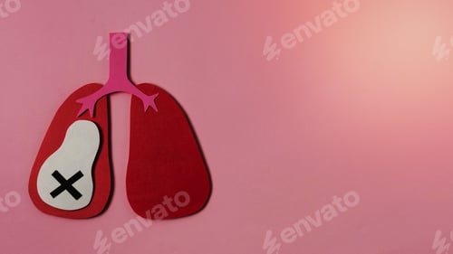 Preview: Fuzzy paper cutout of human lungs against a bright pink background