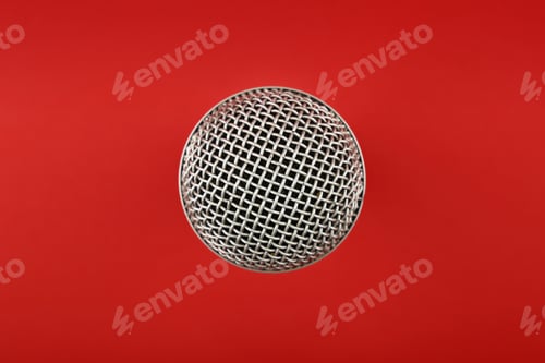 Preview: Microphone close up top view over red