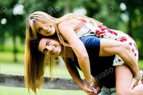 Preview: Happy couple in love having fun outdoors