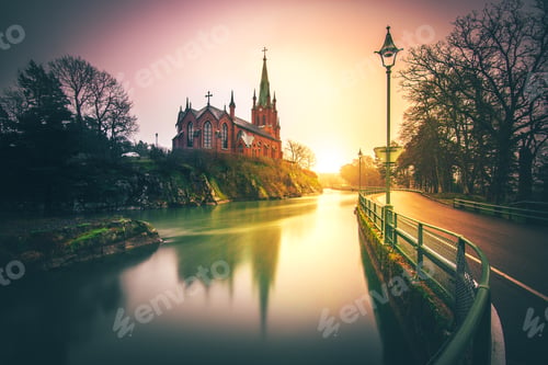 Preview: an image of a beautiful sunset over the water in a park