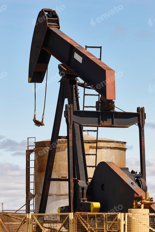 Preview: Rusty oil pumping machine. Pump jack. Petroleum extraction. Global warming