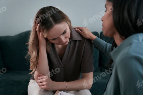 Preview: Woman consoling her female friend during a difficult situation