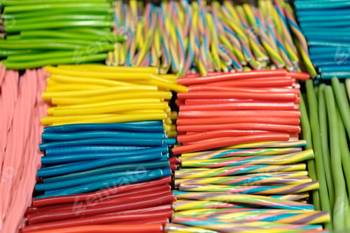 Preview: Multi-colored long jelly candies in the store.