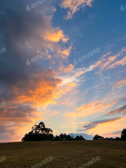 Preview: Colorful cloudy sky at sunset, beautiful nature background