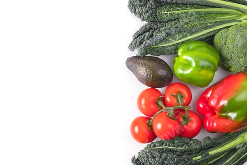 Preview: Fresh vegetables frame. Black kale leaves, tomatoes branch, red and green bell pepper, avocado