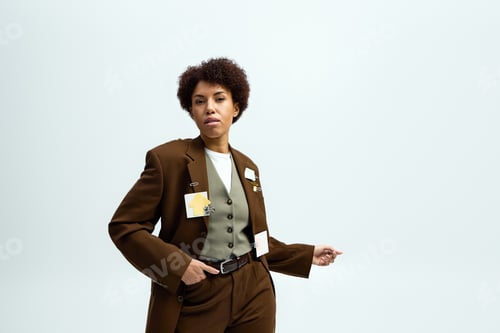 Preview: Elegant young woman showcasing stylish attire in a contemporary fashion setting