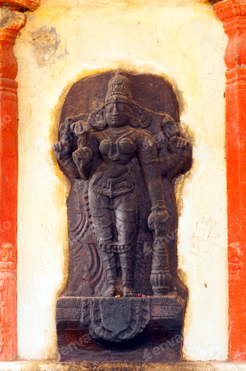 Preview: Spiritual stone statue of hindu god in ancient temple, India.