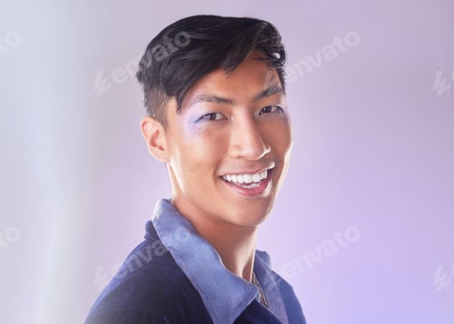 Preview: Makeup, smile and portrait of gay man from Indonesia with confidence isolated on purple background.