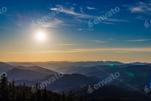 Preview: Mountain valley with mountain ranges sheltered by dark forests in Rhodope Mountains