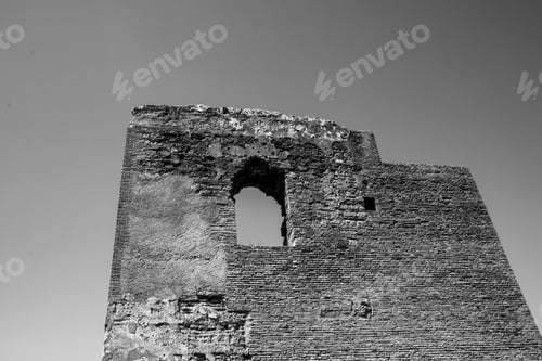 Preview: Window on a ancient stone wall, black and white photography