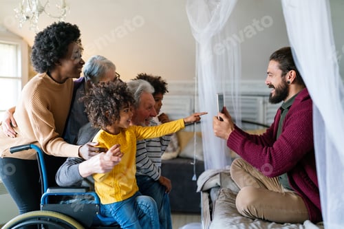 Preview: Three generation happy multiethnic family group at home