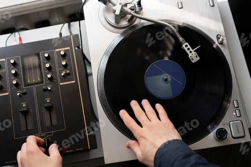 Preview: a dj playing music on turntables, dance on party