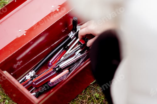 Preview: Selective focus shot of a car tool set