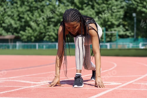 Preview: Black girl athlete getting ready for running to fix new record or daily outdoor cardio workout