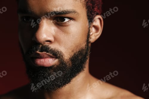 Preview: Black shirtless bearded man posing and looking aside