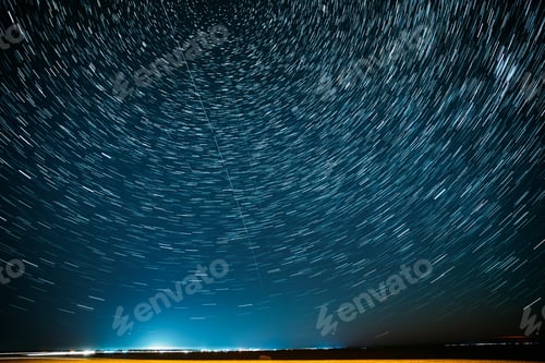 Preview: Flight Of Fancy. Unusual Amazing Star Trails On Night Sky Backgr