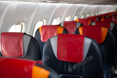 Preview: Empty cabin of the plane. Soft seats for passengers, portholes. Inside a passenger plane. A seat on