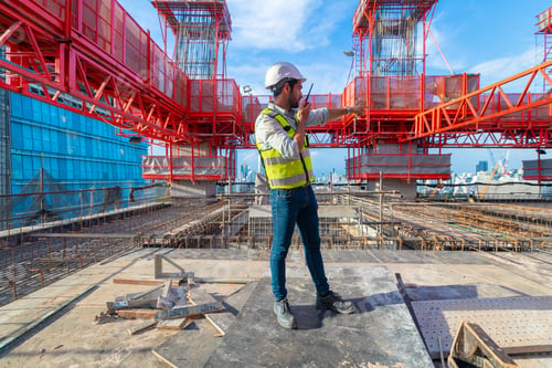 Preview: Portrait of an engineer designing a concrete floor and column structure for a shopping center.