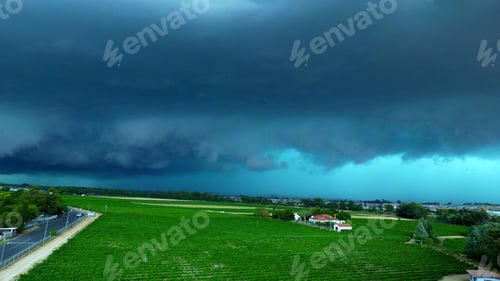 Preview: Drone Flying over vineyard with hail storm clouds in background, Paarl South Africa.