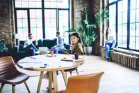 Preview: Thoughtful Asian woman working in office