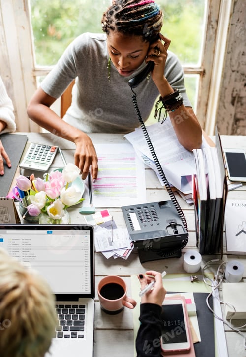 Preview: Editor Woman Talking on The Phone at Office