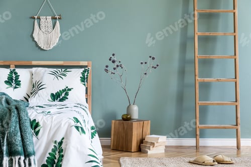 Preview: Creative composition of cozy and stylish bedroom with copy space.