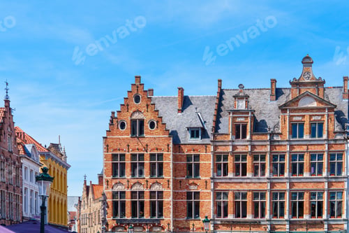 Preview: Charming and colorful old buildings with brick facades in the city center of Bruges, Belgium