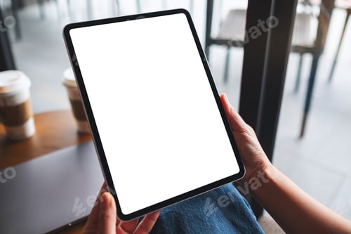 Preview: Mockup image of a woman holding digital tablet with blank white desktop screen