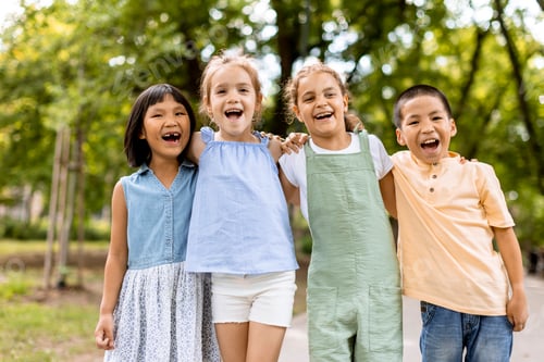 Preview: Group of asian and caucasian kids having fun in the park